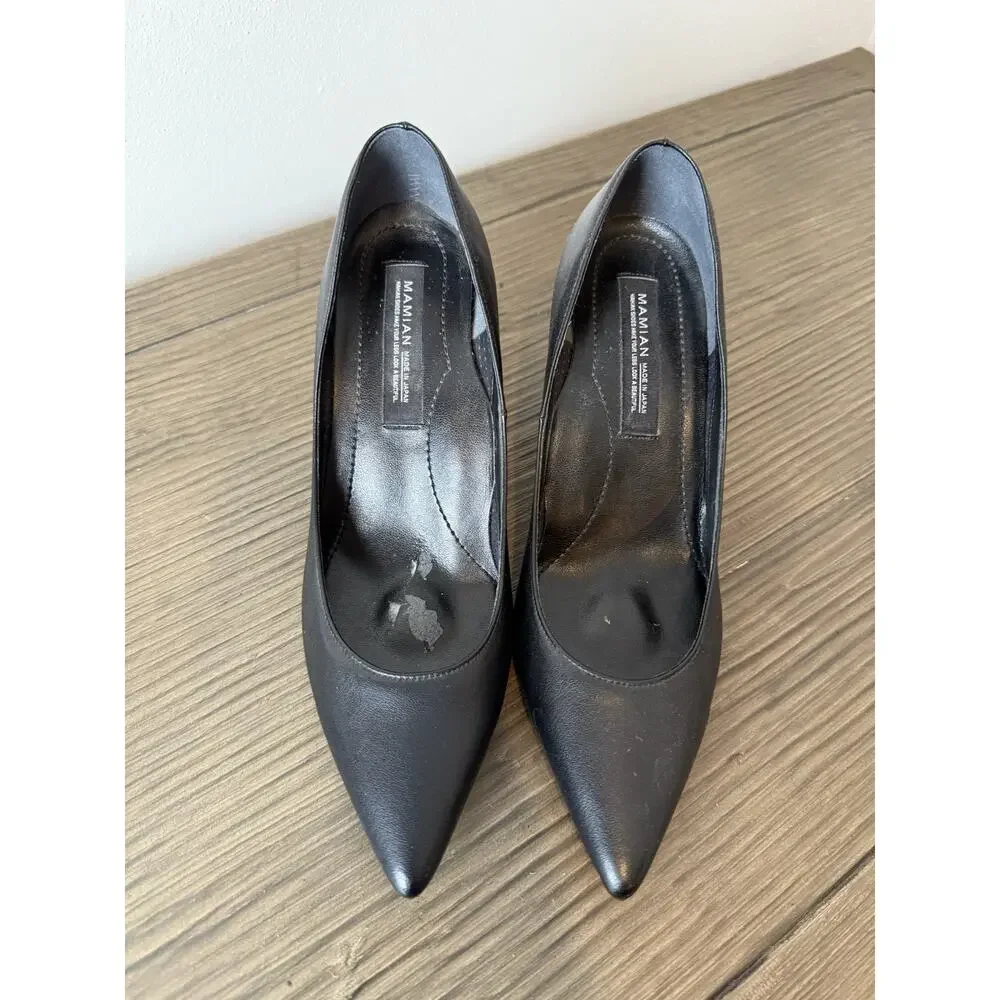 Mamian black pumps
